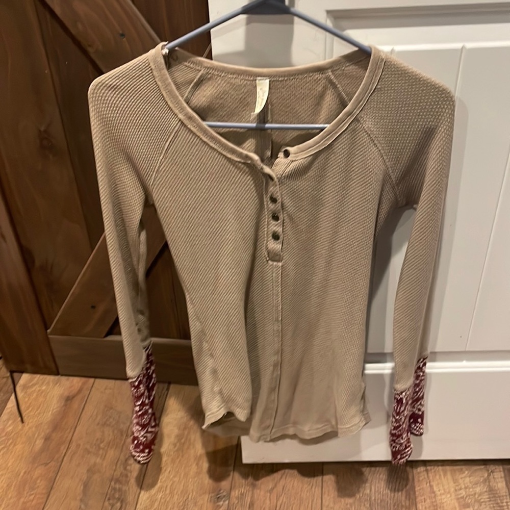 Free people brown top with red and white detail on sleeves good condition